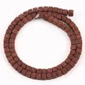 Close-up detail of 4x4mm brown square lava stone beads for DIY craft jewelry making. - 85 Pieces/Pack / Burgundy