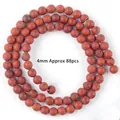 Detailed view of 4mm natural red jasper beads for DIY jewelry making. - Matte Red Jasper / 4mm / Red Stone (Matte)