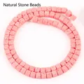 Detailed macro view of pink 4x4mm square lava stone beads for jewelry DIY - 85 Pieces/Pack / Pink