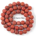 Macro detail of 8mm natural red stone round beads for DIY handmade bracelet jewelry making - Matte Red Jasper / 8mm / Red Stone (Matte)