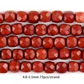 Detailed close-up of faceted red jasper natural stone beads for DIY jewelry making - Faceted Cube Red Stone / 5mm / Red Jasper