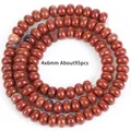 Detail view of 4x6mm natural red jasper rondelle loose beads for DIY jewelry making - Abacus Red Stone Bead (Style 2) / 4x6mm / Red Jasper