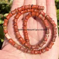 Detail of 6x9mm red jasper spacer beads for DIY jewelry making, 41pcs per strand. - Bamboo Segment Red Stone / 6x9mm / Red Jasper