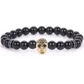 Handmade 8mm black stone bead bracelet with a micro-paved gold skull charm for men - 19cm 8mm / Black Agate Gold Skull