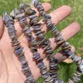 Macro view of natural bohemian crushed shell beads for artisanal jewelry DIY crafts - Single String / Gray