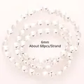 Dettaglio di perle di ematite placcate argento da 6mm per la creazione di gioielli fai da te. - Stile Pezzo Rotondo Arcato a Foro Orizzontale / 6mm (Circa 68pz/Filo) / Argento lucido