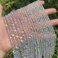 Macro shot showing prismatic rainbow AB crystal round beads for DIY jewelry making - 4mm (Approx. 99 Pcs/Strand) / AB Iridescent Clear
