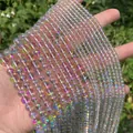 Detail shot of iridescent AB coated crystal round beads for DIY jewelry making - 4mm (Approx. 99 Pcs/Strand) / AB Pink Blue Mix