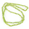 Macro view of 2x4mm faceted light green iridescent glass beads for jewelry making - 1 Strand/Pack (2x4mm) / Solid Grass Green