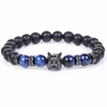 Macro view of 8mm blue tiger eye and obsidian bracelet with wolf head charm - Matte Black Blue Tiger Eye Style / 8mm / 19cm