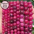 Vista macro de cuentas redondas de ágata calcedonia rosa oscuro para accesorios de joyería - 6mm aprox. 58 piezas / Ágata de Jade Rojo Rosa Optimizada
