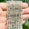 Nahaufnahme von 4x2mm Fluorit-Abakusperlen-Strängen für DIY-Schmuckherstellung. - Ein Strang (Ca. 160 Stück) / Fluorit