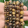 Detailed view of natural snowflake turquoise round beads for DIY jewelry making. - 6mm Approx 58 Pieces / Yellow Snowflake Turquoise