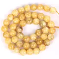 Round honey yellow natural stone loose beads for DIY jewelry and necklace making - 6mm / Yellow Calcite