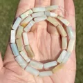 Detailed view of natural Amazonite rectangular bar beads held in hand showing stone textures - Irregular Shape / Rectangular Column Amazonite 4x13mm