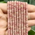 Detailansicht von rosa Naturstein-Abakusperlen für die DIY-Schmuckherstellung. - Ein Strang (Ca. 160 Stück) / Rhodonit