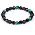 Close-up of 8mm green tiger eye and black lava stone beads on a stretch bracelet - Polished Black Volcanic Stone Green Tiger Eye (B0058) / 8mm Bead - 19cm Circumference / Green Tiger Eye + Black Volcanic Stone
