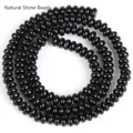 Detailansicht der schwarzen 2x4mm Naturstein-Abakus-Perlen für DIY-Schmuckherstellung - ca. 160 Perlen/Strang / Schwarzer Achat