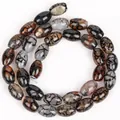 Detailed view of coffee brown dragon vein agate oval beads for DIY jewelry making. - 8x12mm Oval Rice Beads / 31 Pieces/Strand / Black Red Bicolor Agate Rice Beads