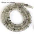 Detailansicht von 2x4mm grauen Naturstein Perlen für die DIY Schmuckherstellung - 2x4mm Abakusperlen (ca. 160 Perlen/Strang) / Labradorit