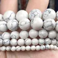 Detailed macro view of natural white turquoise round beads for DIY jewelry crafting - Synthetic Style / 3mm