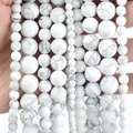Macro detail of natural white turquoise round beads with grey marble veins for DIY jewelry - Matte Natural Style / 4mm