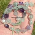 Macro detail of faceted natural colorful fluorite beads for DIY jewelry making - Faceted Rondelle
