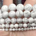 Close-up of natural white howlite beads with grey marble patterns in various sizes. - Natural Style / 2.0mm