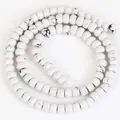 Détail de perles de turquoise blanche naturelle howlite pour la création de bijoux DIY - Style rondelle naturelle / 4x6MM