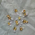 Lente/zomer madeliefje nail art kit met champagne strass, parels en harsbloemen set - Goud Madeliefje Materiaal Kit
