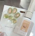 Green cat-eye gel nail polish with translucent glass bead effect, 15ml bottle size - Guava Cat Eye Gel