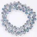 Macro view of 6mm iridescent blue faceted teardrop crystal beads for DIY jewelry crafts - Horizontal Hole Water Drop Faceted (s3847-04) / Approx. 88 Pieces/Pack / Transparent Blue Light