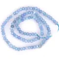Vue macro détaillée de perles facettées de 3x4mm en calcédoine bleue naturelle. - 3x4mm (Environ 105 Pièces/Fil) / Jade Bleu