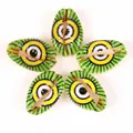 Detail view of five green and yellow eye-patterned cowrie shell beads for DIY jewelry - 10 Pieces Pack / Black Eye Green Shell