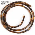 Detailed view of 4x2mm cylindrical brown tiger eye stone beads for DIY jewelry making - Yellow Tiger Eye / 80-82 Pieces/Pack