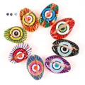 Macro view of colorful cowrie shell beads with vibrant printed evil eye patterns - 10 Pieces Pack / Eye Mixed Styles