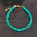 Elegant turquoise disc bead bracelet with a gold-tone lobster clasp and charm - 17cm Plus Extender 6x2mm / Turquoise Disc Bracelet