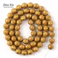 Strand of faceted matte gold electroplated hematite beads for DIY jewelry making. - 2mm (193 Pieces/Pack) / Gold