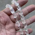 Detailopname van heldere natuurlijke kwarts gefacetteerde achthoekige kralen - Gefacetteerde Octogonale Losse Kralen / 8x12mm, Ongeveer 32 Stuks / Helder (Lichte Insluitingen)