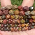 Close-up of multi-colored faceted natural stone beads for DIY jewelry making - 6mm Approx 58 Pieces / Faceted Picasso Red Stone