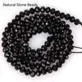 Detaillierte Makroansicht von 3x4mm schwarzen facettierten Natursteinkugeln für DIY - 3x4mm (Ca. 105 Stück/Strang) / Schwarzer Achat