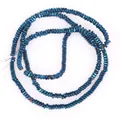 Close-up of 2x1mm flat square hematite beads in metallic blue finish for DIY jewelry. - Approx 340 Pieces/Strand / Blue