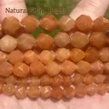 Macro detail of orange faceted natural stone beads for DIY craft jewelry making - 6mm Approx 58 Pieces / #15 Faceted Red Aventurine