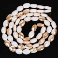 8x11mm faceted oval crystal loose beads in two-tone white and champagne gold color - 56 Pieces / White Jade Half Amber