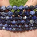 Macro detail of faceted blue sodalite natural stone beads for DIY jewelry making - 6mm Approx 58 Pieces / #29 Faceted Old Blue Vein Stone