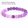 Detail shot of purple dragon vein agate beads showing unique weathered texture. - 19cm / 6mm / Purple Weathered Stone