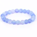 Detailed macro view showing blue weathered agate beads with unique white cracked texture - 19cm / 6mm / Light Blue Weathered