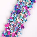 Detailed macro view of colorful camouflage turquoise cross-shaped DIY jewelry beads - Cross / 12x16mm / Light Camouflage