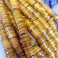 Macrodetail van 5-8 mm natuurlijke schijfkraaltjes van schelpen voor DIY-sieraden - 7-8mm (ca. 38cm Strand) / Geel