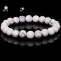 Natural white howlite stone bead bracelet with marble pattern on black background - White Howlite